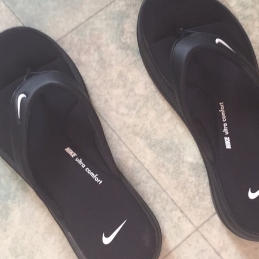 Reposted! Nike flip flops size 7